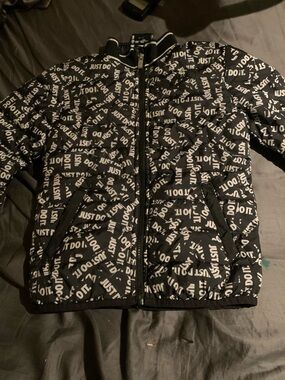 Nike Black Puffer Jacket with White "Just Do It" All-Over Print